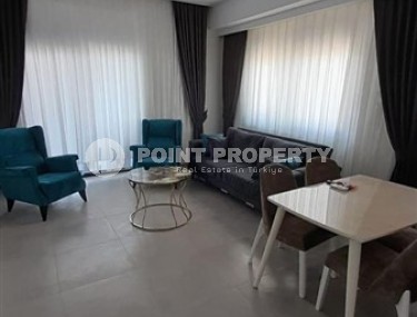 Small apartment 1+1, with a total area of 54 m2, 700 meters from the sea, in the center of Mahmutlar-id-5816-photo-2