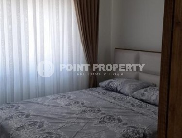 Small apartment 1+1, with a total area of 54 m2, 700 meters from the sea, in the center of Mahmutlar-id-5816-photo-3