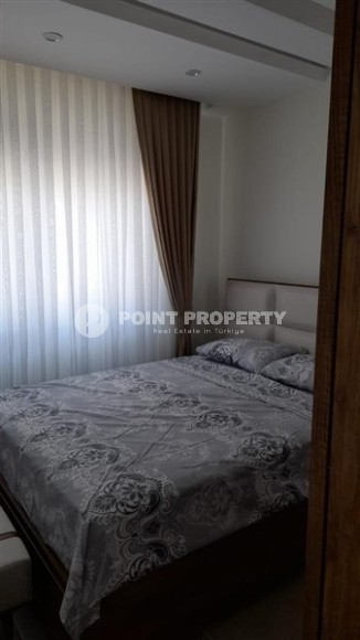 Small apartment 1+1, with a total area of 54 m2, 700 meters from the sea, in the center of Mahmutlar-id-5816-photo-3