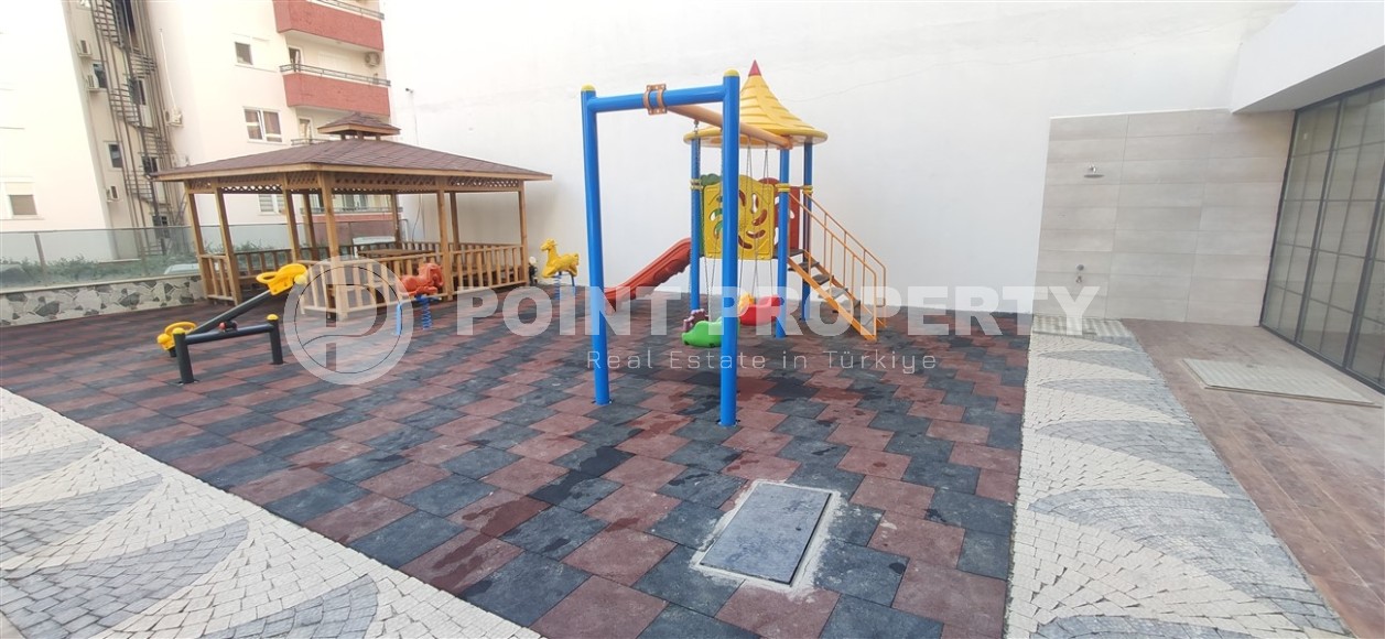 Small apartment 1+1, with a total area of 54 m2, 700 meters from the sea, in the center of Mahmutlar-id-5816-photo-9