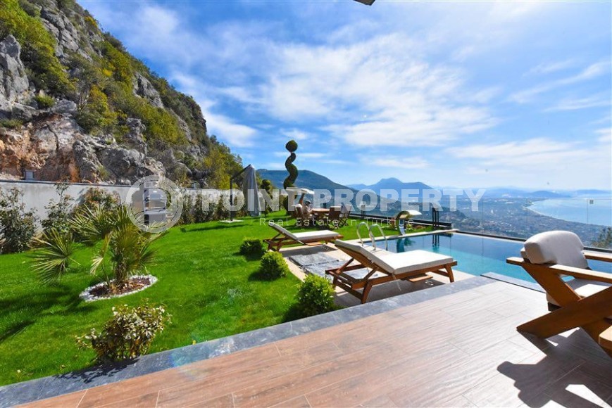 Новая двухэтажная вилла с роскошным панорамным видом на море, в элитном районе Аланьи - Тепе-id-5830-фото-31