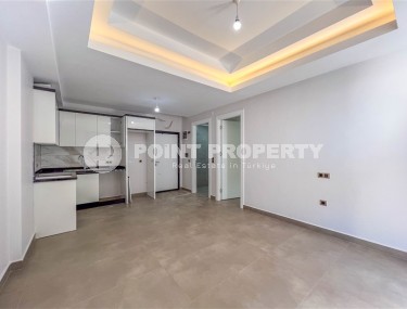 Новая квартира с чистовой отделкой, в самом центре района Махмутлар, и в 150 метрах от моря-id-5834-фото-2