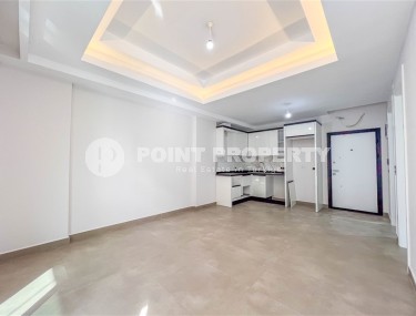 Новая квартира с чистовой отделкой, в самом центре района Махмутлар, и в 150 метрах от моря-id-5834-фото-3