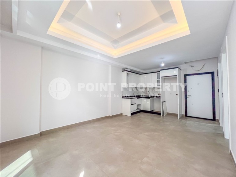 Новая квартира с чистовой отделкой, в самом центре района Махмутлар, и в 150 метрах от моря-id-5834-фото-3