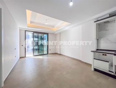 Новая квартира с чистовой отделкой, в самом центре района Махмутлар, и в 150 метрах от моря-id-5834-фото-4