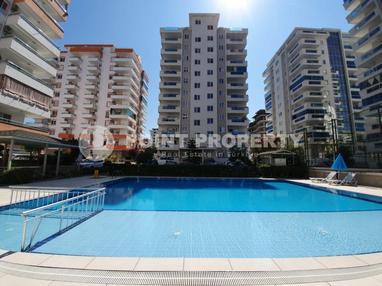 Просторная двухуровневая квартира с чистовой отделкой, в центре района Махмутлар-id-5835-фото-1