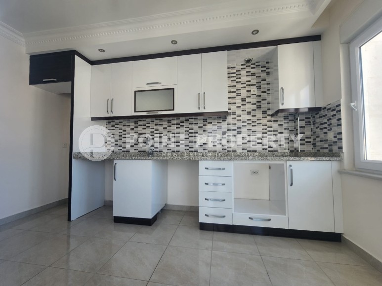 Просторная двухуровневая квартира с чистовой отделкой, в центре района Махмутлар-id-5835-фото-2