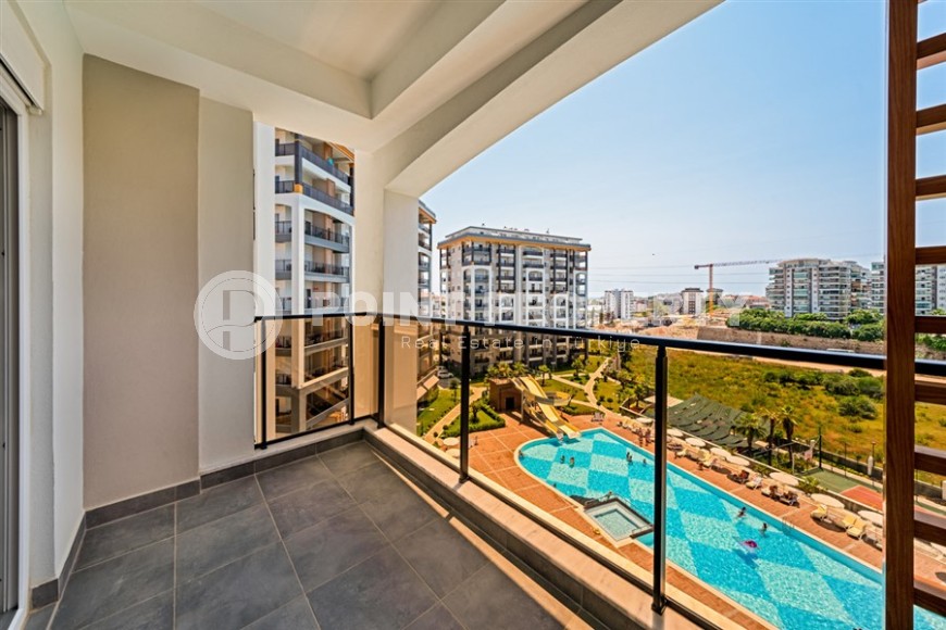 Новая меблированная квартира 1+1, общей площадью 48 м2, в современном жилом комплексе, в районе Авсаллар-id-5843-фото-6