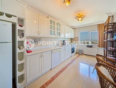 Large two-level apartment 4+1, with a total area of 250 m2, on the 9th floor with an attic, in the Mahmutlar area-id-5849-photo-2