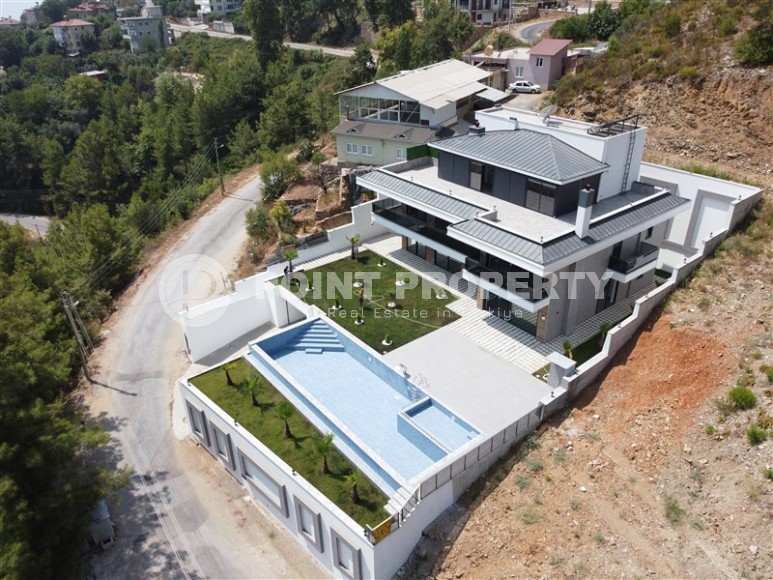 Luxurious three-storey villa with a swimming pool and garden, in a prestigious area of Alanya - Tepe-id-5851-photo-21
