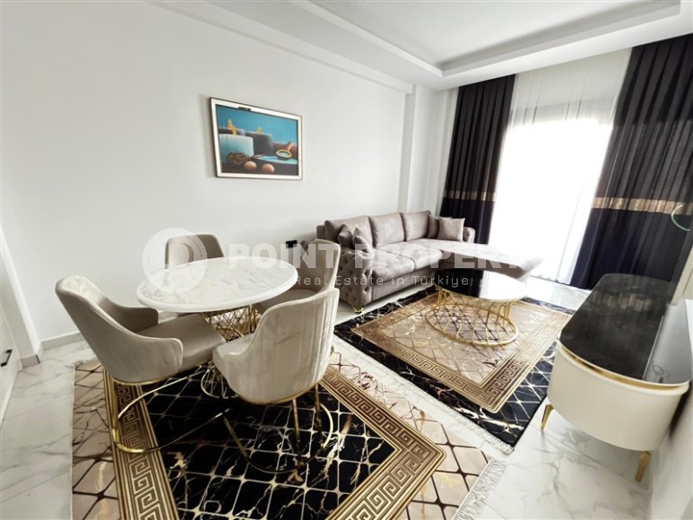 New furnished 1+1 apartment, with a total area of 52 m2, in a picturesque, quiet area of Alanya - Upper Oba-id-5870-photo-3