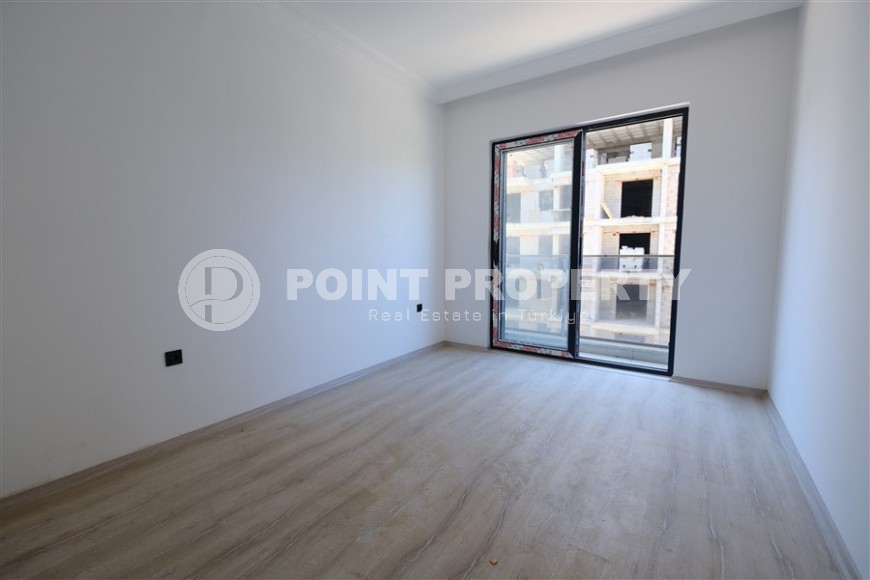 Небольшая новая квартира с чистовой отделкой, в центре современного района Аланьи - Махмутлар-id-5876-фото-4