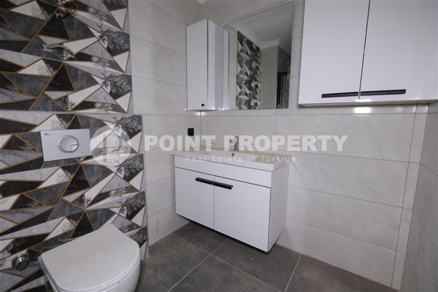 Небольшая новая квартира с чистовой отделкой, в центре современного района Аланьи - Махмутлар-id-5876-фото-5