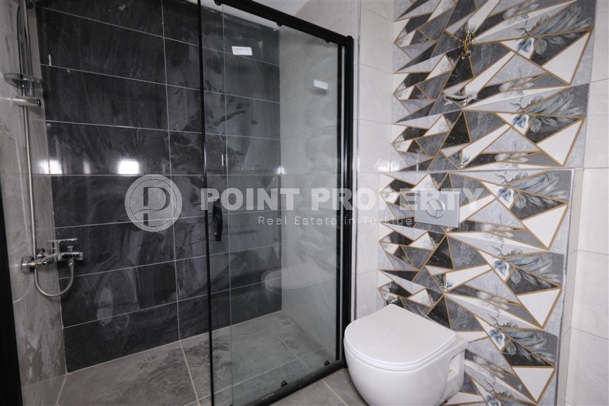 Небольшая новая квартира с чистовой отделкой, в центре современного района Аланьи - Махмутлар-id-5876-фото-6