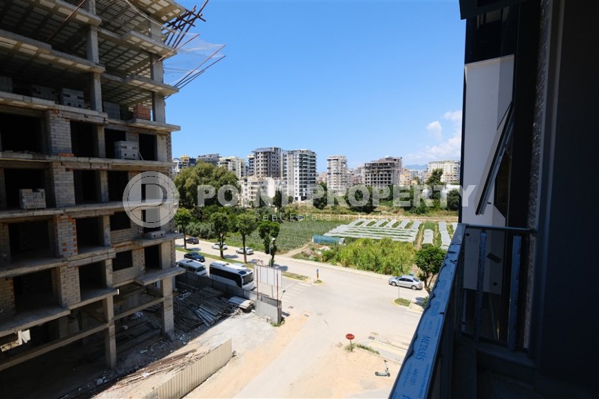 Небольшая новая квартира с чистовой отделкой, в центре современного района Аланьи - Махмутлар-id-5876-фото-7