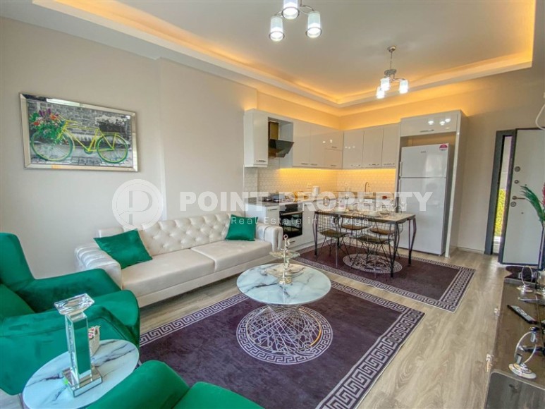 Комфортабельная новая квартира 1+1, общей площадью 50 м2, в 800 метрах от моря-id-5878-фото-2