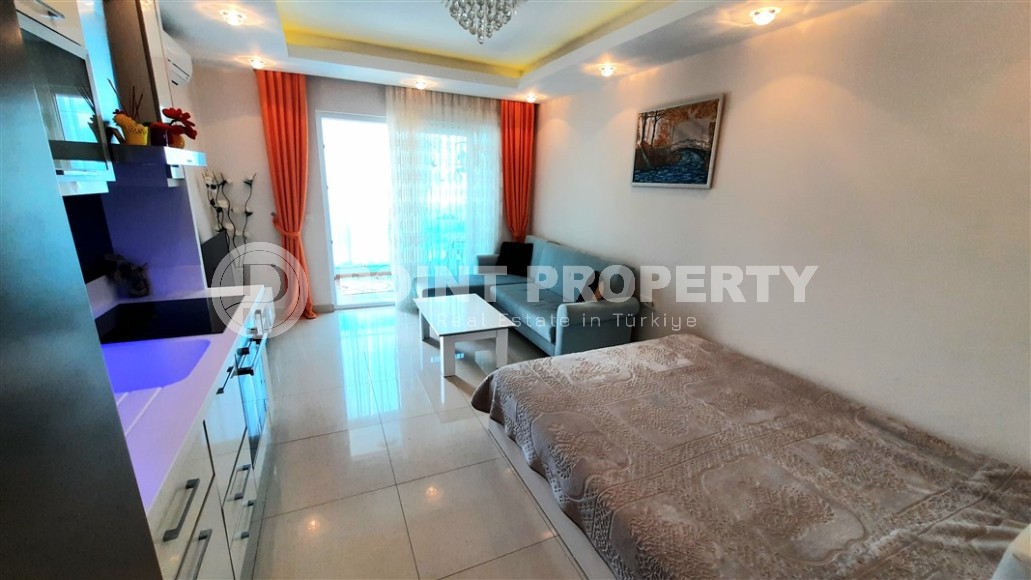 Компактная студия, на площади 35 м2, в 200 метрах от моря, в центре района Махмутлар-id-5881-фото-3