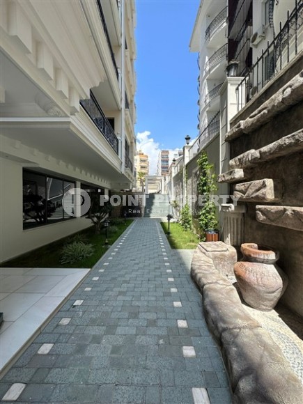 Apartment with designer renovation on the first line from the sea, in the Mahmutlar area-id-5893-photo-24