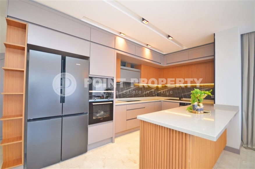 Современная триплексная вилла 4+1 в районе Каргыджак, 2022 года постройки-id-3152-фото-5