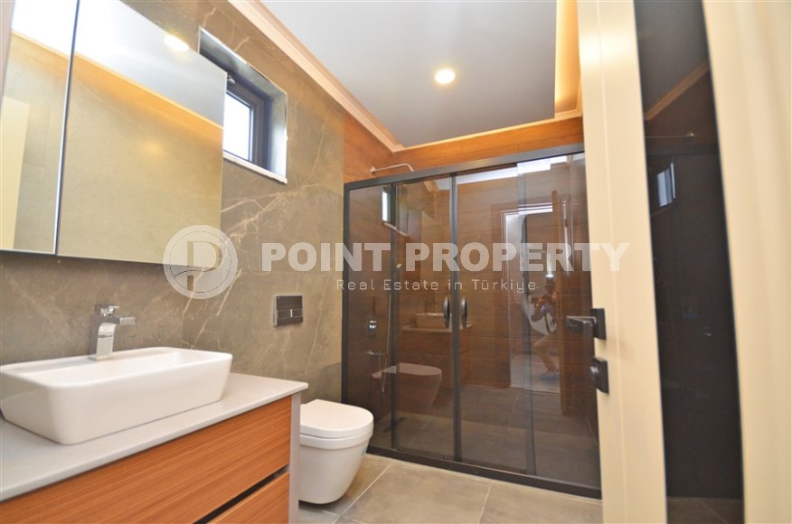 Современная триплексная вилла 4+1 в районе Каргыджак, 2022 года постройки-id-3152-фото-9