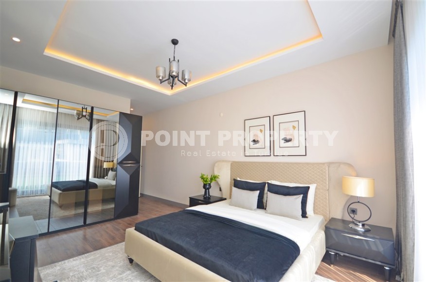 Современная триплексная вилла 4+1 в районе Каргыджак, 2022 года постройки-id-3152-фото-11