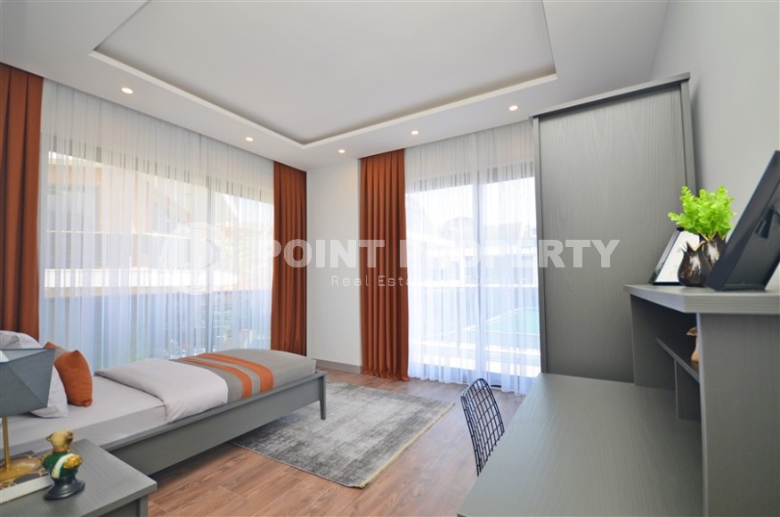 Современная триплексная вилла 4+1 в районе Каргыджак, 2022 года постройки-id-3152-фото-13