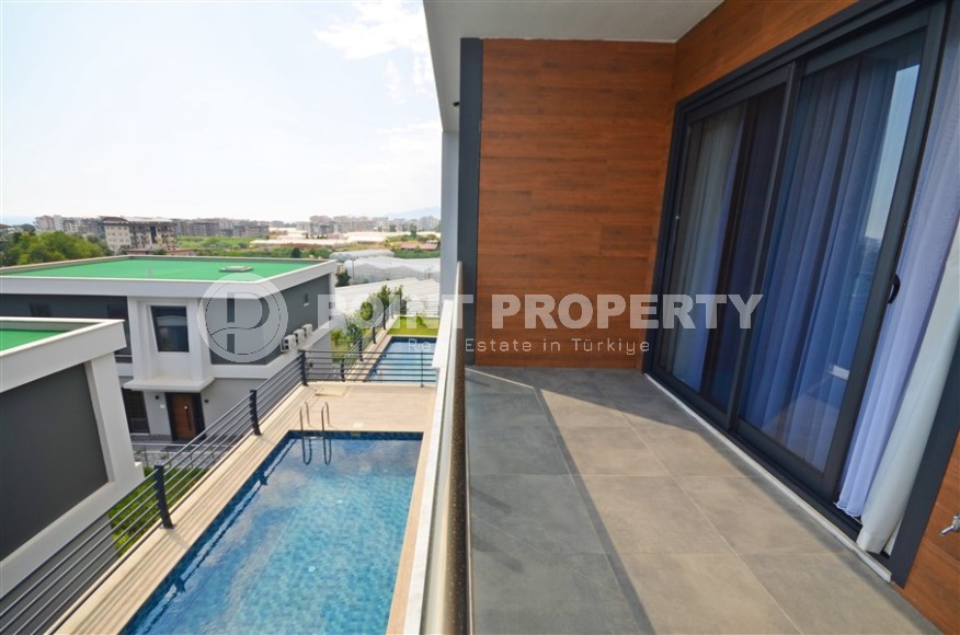 Современная триплексная вилла 4+1 в районе Каргыджак, 2022 года постройки-id-3152-фото-14