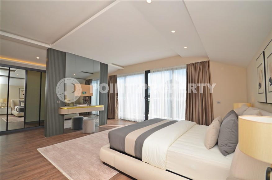 Современная триплексная вилла 4+1 в районе Каргыджак, 2022 года постройки-id-3152-фото-20