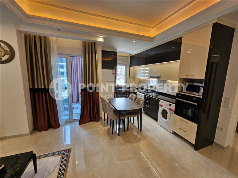 Spacious, comfortable apartment with a large glazed balcony, 500 meters from the sea, in the center of Mahmutlar-id-5902-photo-3