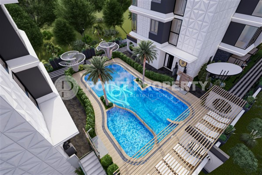 Двухкомнатная квартира, 47м², в строящемся комплексе с оптимальной инфраструктурой, в Махмутларе, Аланья-id-1462-фото-13