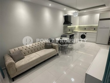 Небольшие апартаменты планировкой 1+1, в новом жилом комплексе в центральном районе города Аланья-id-5345-фото-3