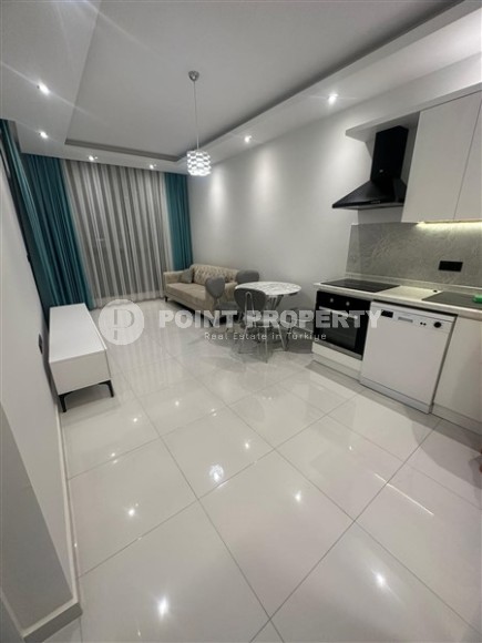 Небольшие апартаменты планировкой 1+1, в новом жилом комплексе в центральном районе города Аланья-id-5345-фото-8