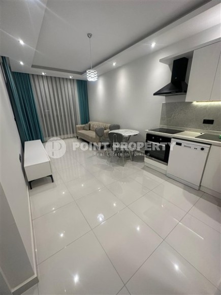 Небольшие апартаменты планировкой 1+1, в новом жилом комплексе в центральном районе города Аланья-id-5345-фото-12