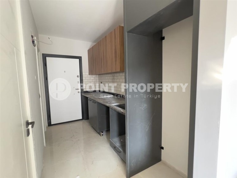 Compact apartment with fine finishing 400 meters from the beach, in the Mahmutlar area-id-5922-photo-2