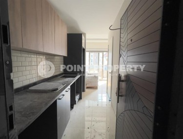 Compact apartment with fine finishing 400 meters from the beach, in the Mahmutlar area-id-5922-photo-3