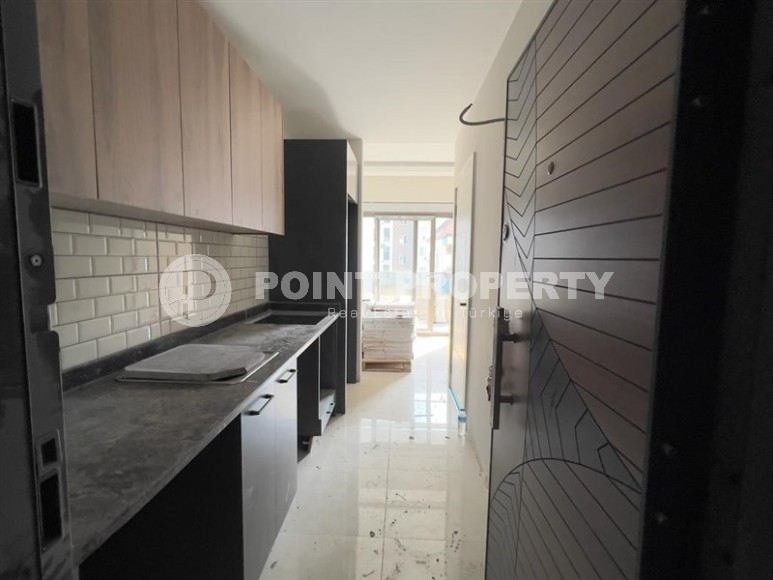Compact apartment with fine finishing 400 meters from the beach, in the Mahmutlar area-id-5922-photo-3