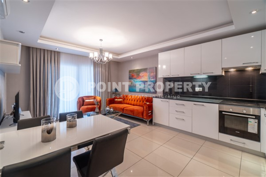 Furnished three-bedroom apartment, 140m², in a luxury complex in Alanya - Cikcilli-id-1463-photo-9