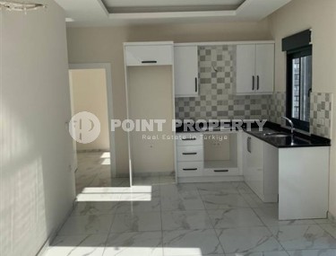 New apartment with fine finishing 650 meters from the sea, in the center of Mahmutlar-id-5929-photo-2