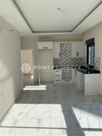 New apartment with fine finishing 650 meters from the sea, in the center of Mahmutlar-id-5929-photo-2