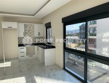 New apartment with fine finishing 650 meters from the sea, in the center of Mahmutlar-id-5929-photo-3