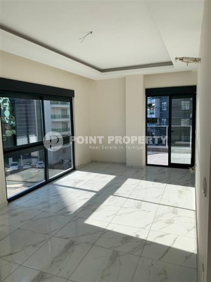 New apartment with fine finishing 650 meters from the sea, in the center of Mahmutlar-id-5929-photo-4