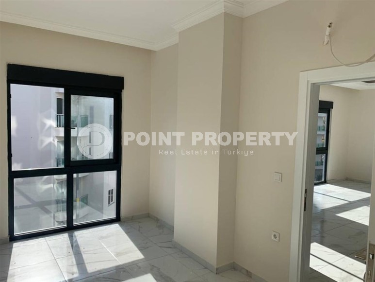 New apartment with fine finishing 650 meters from the sea, in the center of Mahmutlar-id-5929-photo-5