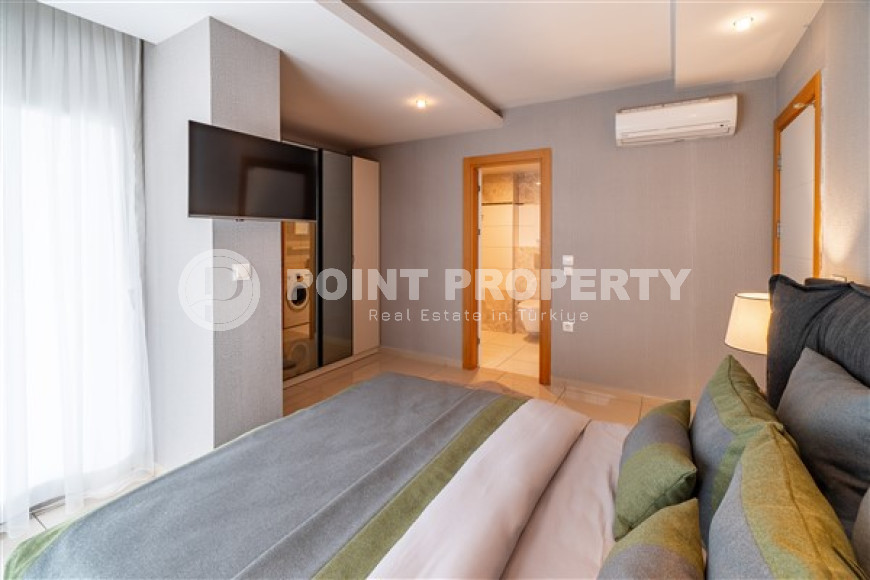 Furnished three-bedroom apartment, 140m², in a luxury complex in Alanya - Cikcilli-id-1463-photo-27