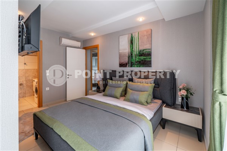 Furnished three-bedroom apartment, 140m², in a luxury complex in Alanya - Cikcilli-id-1463-photo-29