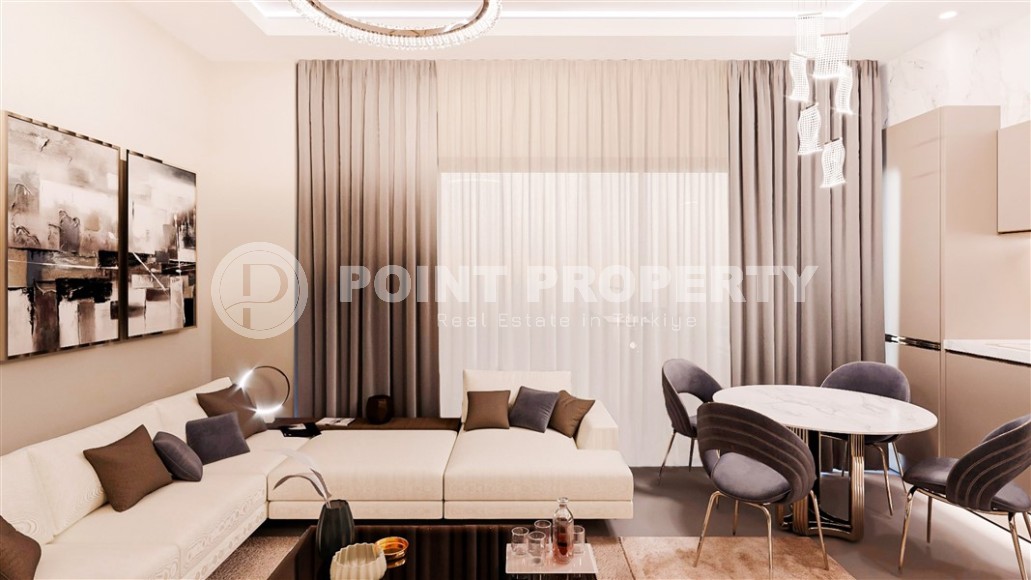 Compact apartment 1+1, with a total area of 55 m2, in a residential complex under construction in the Mahmutlar area-id-5950-photo-2