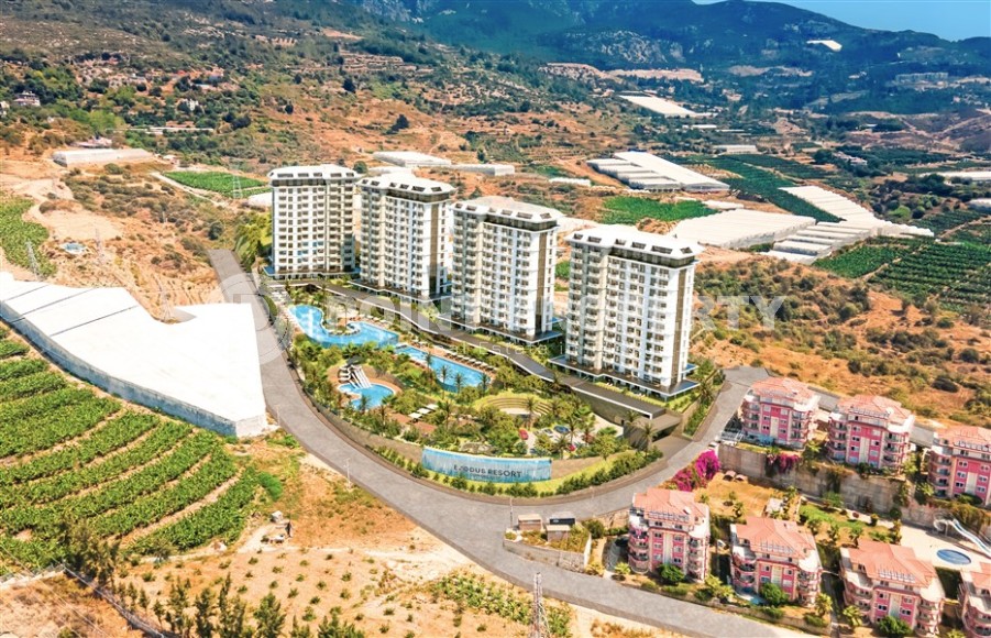 Compact apartment 1+1, with a total area of 55 m2, in a residential complex under construction in the Mahmutlar area-id-5950-photo-20