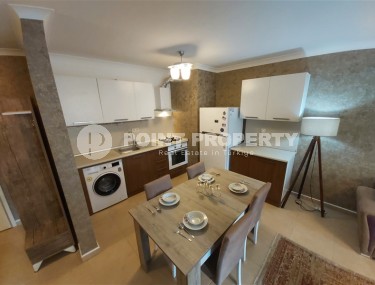 Comfortable furnished apartment on the 1st floor in a building built in 2007, in the center of Mahmutlar district-id-5952-photo-3