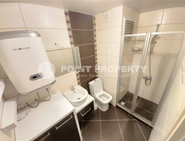 Comfortable furnished apartment on the 1st floor in a building built in 2007, in the center of Mahmutlar district-id-5952-photo-5