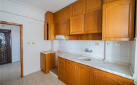 Resale property in the center of Alanya: 3+1 apartment with separate kitchen 400m from Cleopatra Beach.-id-1465-photo-9