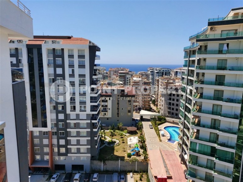 Панорамная двухуровневая квартира с видом на Торосские горы, в 700 метрах от моря, в центре района Махмутлар-id-5956-фото-21